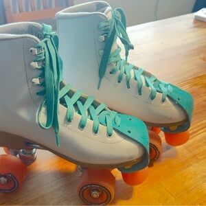 Impala White Roller Skates with Teal Laces and Orange Wheels